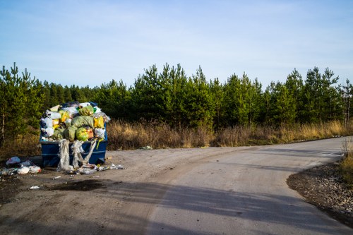 Crew sorting green waste for recycling